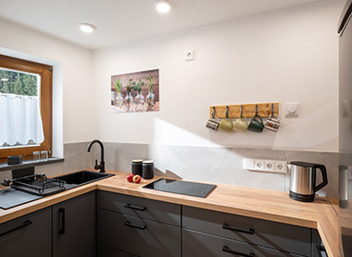 Apartment_Kleeblatt_Muehlberg_1a_Ellmau_Kueche_Galerie