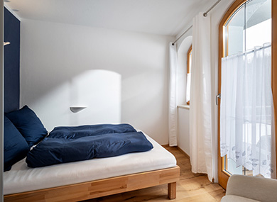 Apartment_Kleeblatt_Muehlberg_1a_Ellmau_Schlafzimmer_1_Galerie