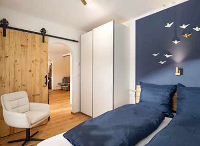 Apartment_Kleeblatt_Muehlberg_1a_Ellmau_Schlafzimmer_Galerie